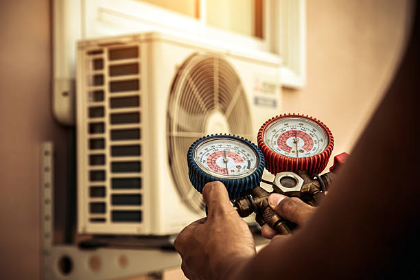 Professional Heat Pump Repair technician working in Weston, CT